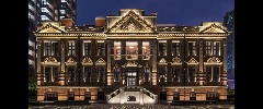 The facade by night of The Bvlgari Hotel Shanghai